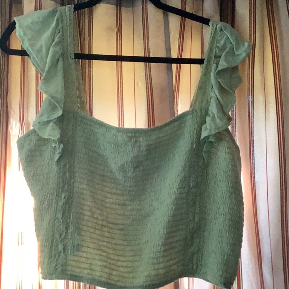 Green SO crop top.